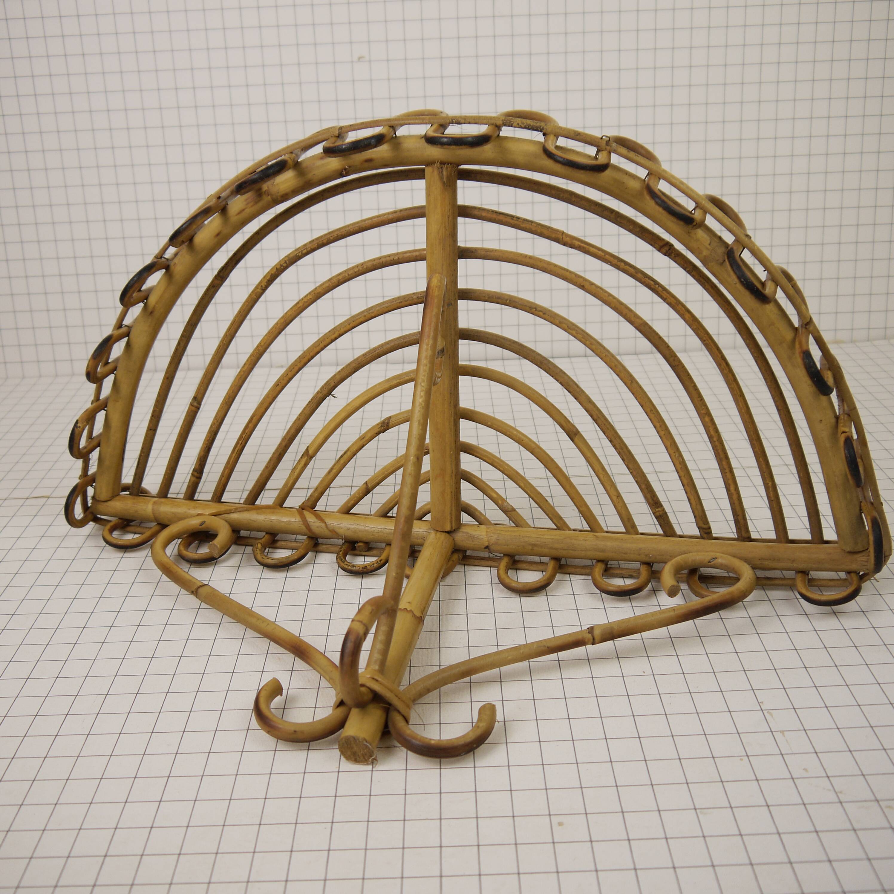 Half-moon rattan shelf and coat holder