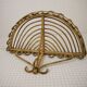 Half-moon rattan shelf and coat holder