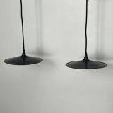 Pair of black enamelled metal bowls