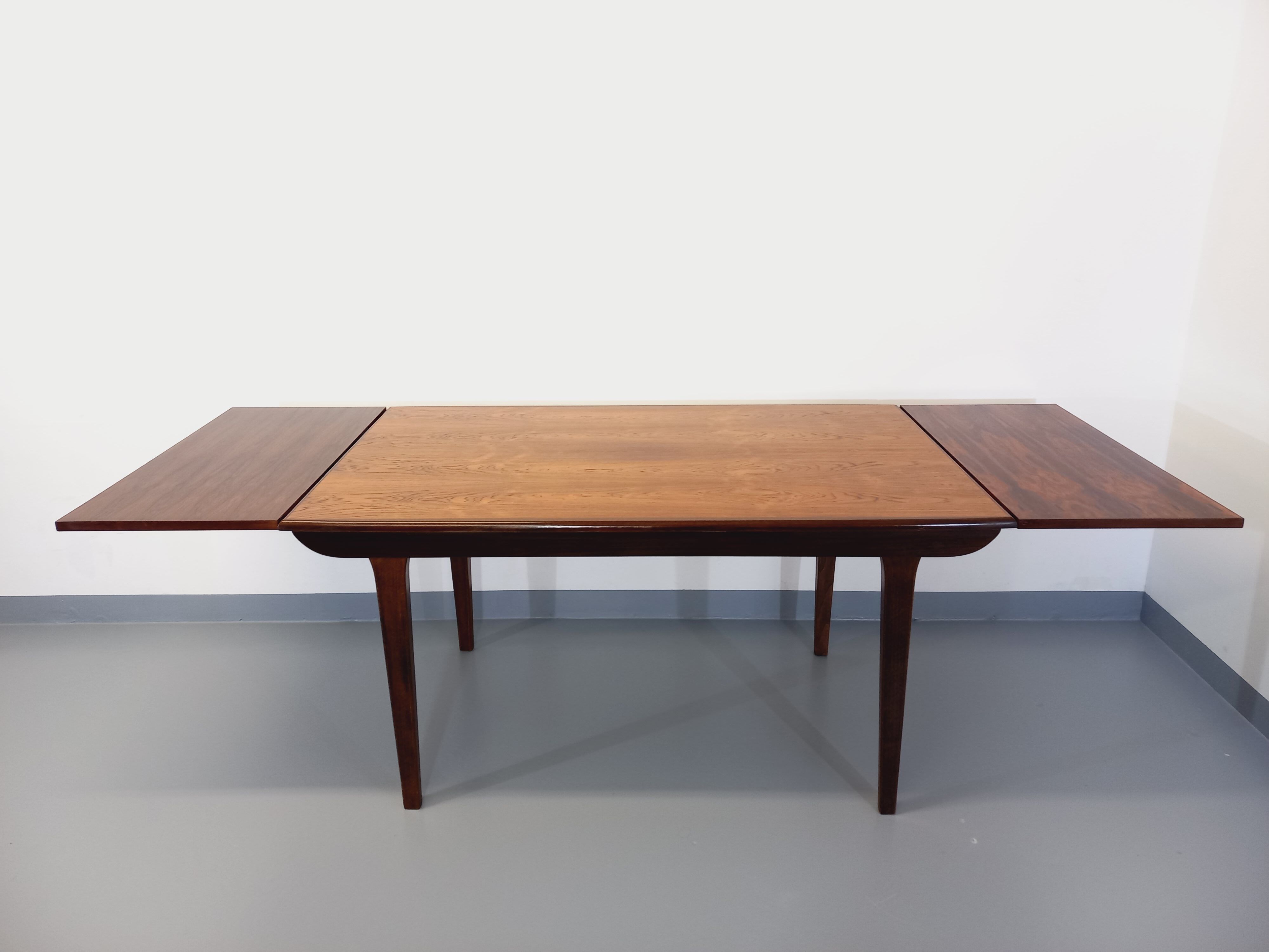 Vintage Scandinavian style dining table from the 50s 60s in rosewood with extensions
