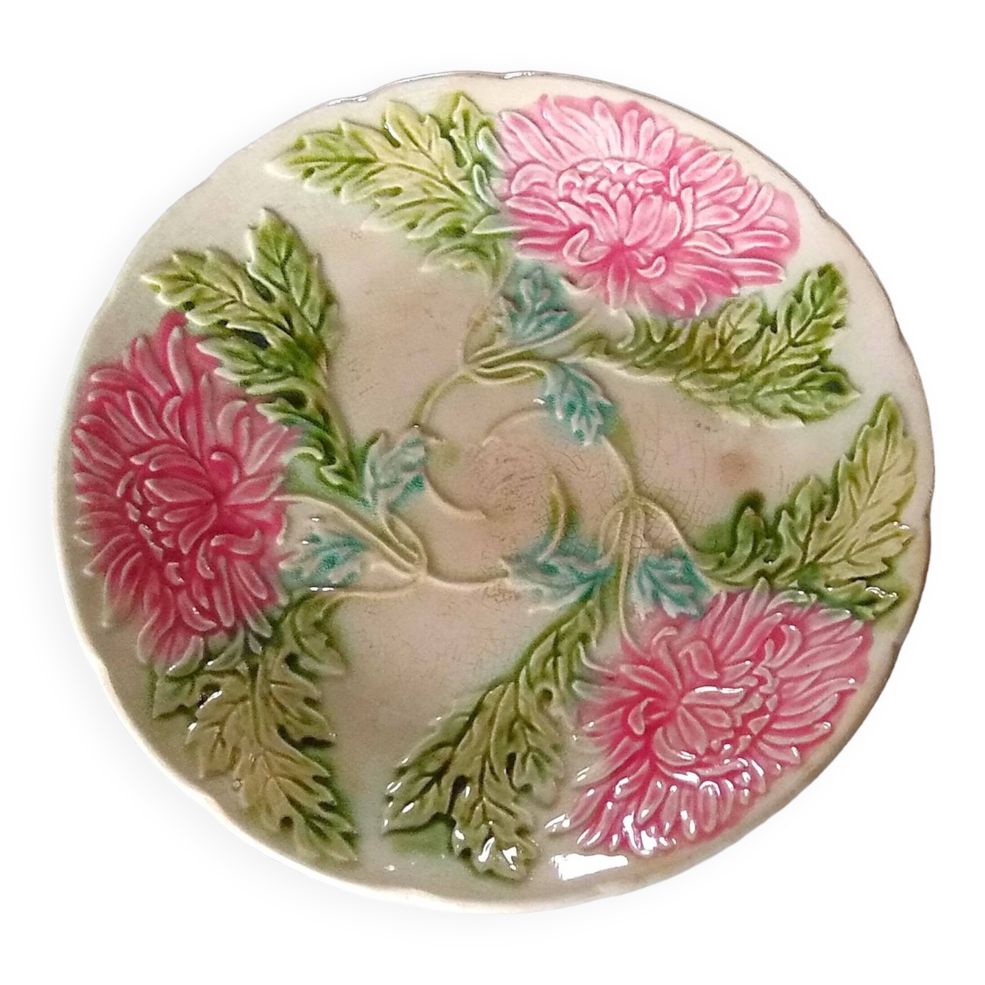 Old flat slip plate from Onnaing with floral decoration