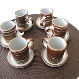 6 coffee cups and sandstone subcups