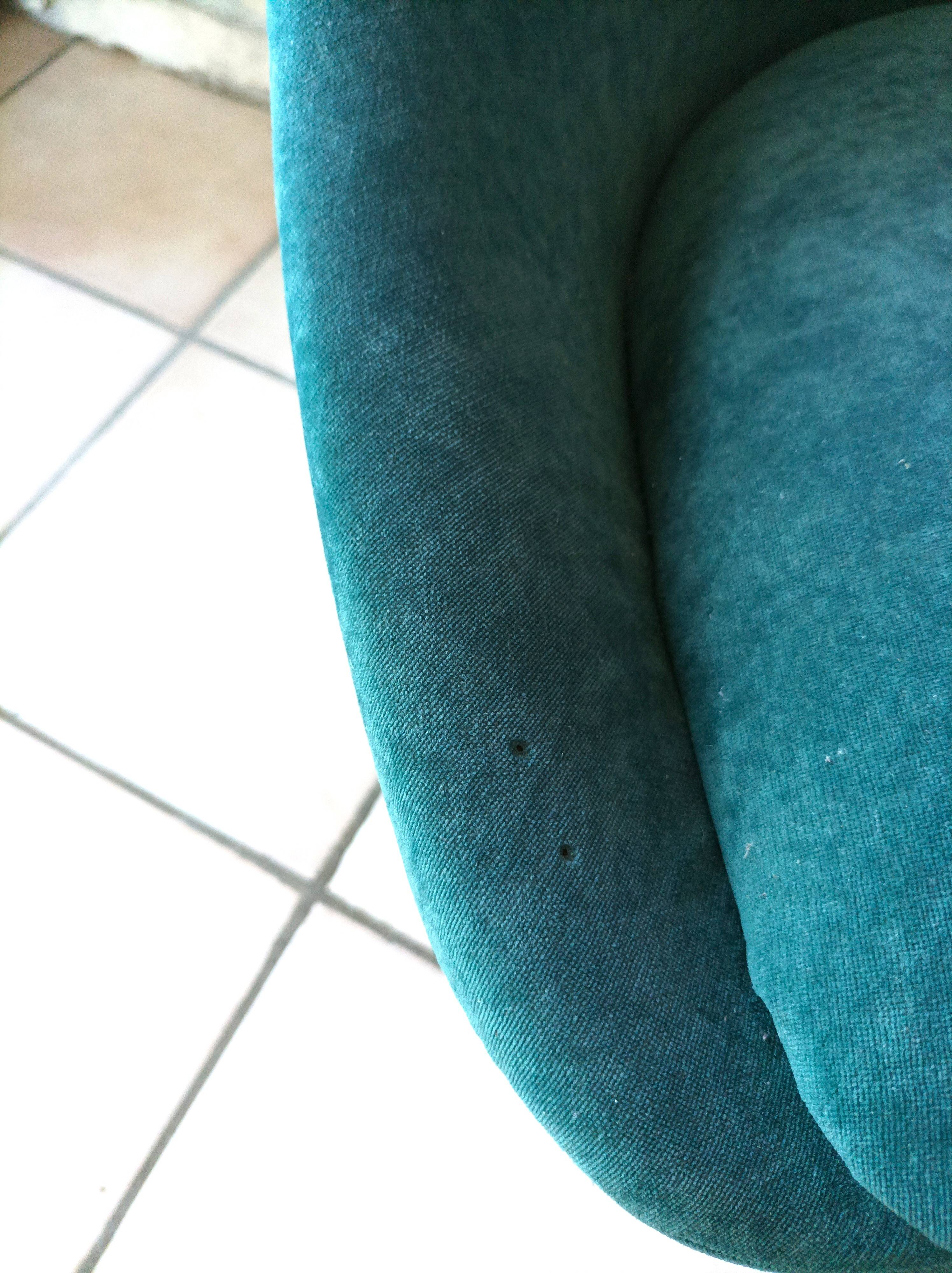 Green velvet armchair