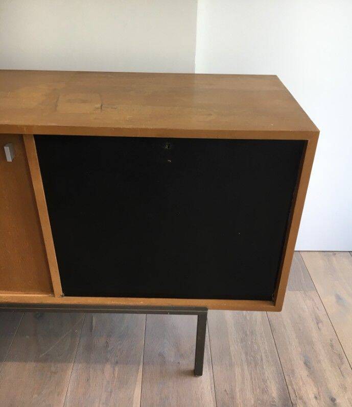 Sideboard with double sliding doors and bar on a metal base