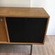 Sideboard with double sliding doors and bar on a metal base
