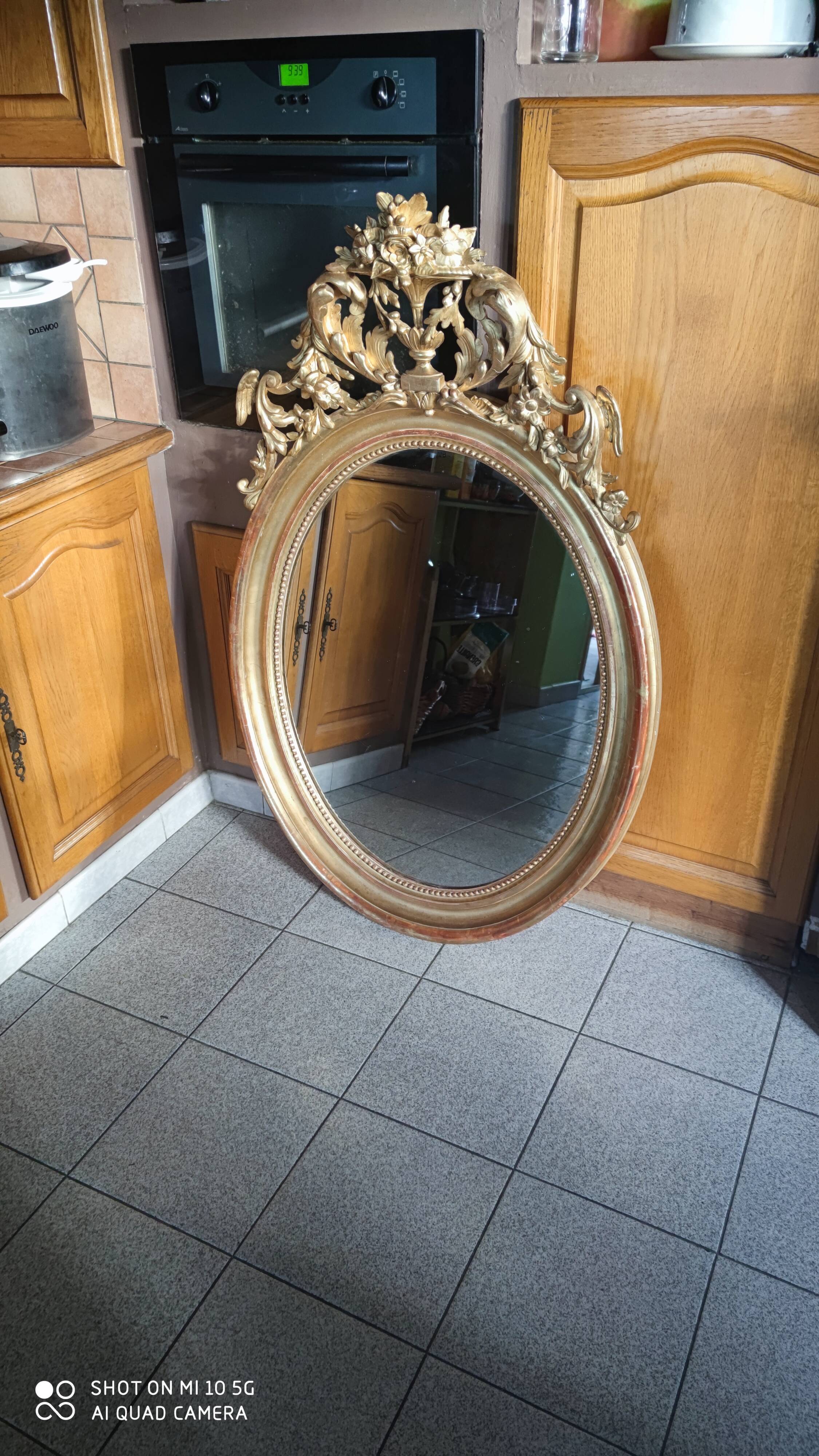 Mirror with a gilt medallion pediment, 1840