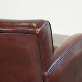 Subtle sheep leather armchair with a beautiful finish and a good patina