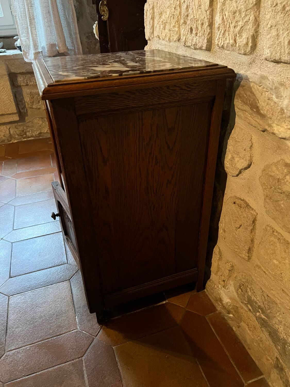 Antique bedside table with marble top