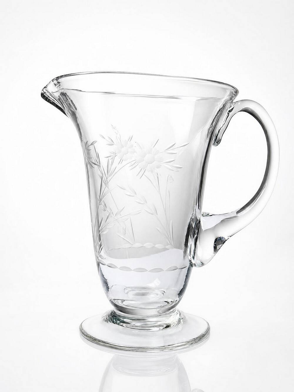 Antique glass pitcher with wheel engraving and floral decoration, Bohemia, early 20th century.