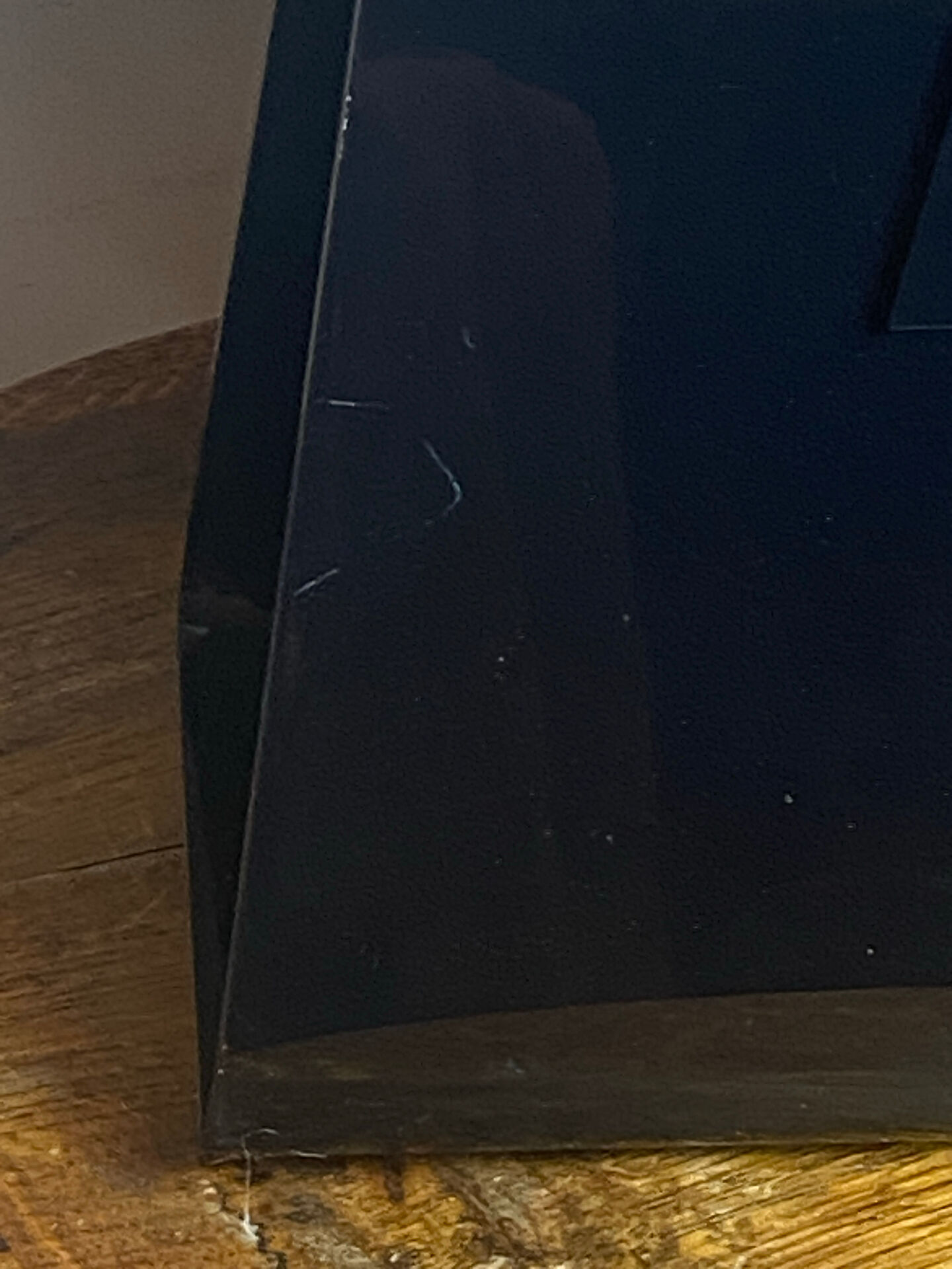 Black plexiglass magazine rack