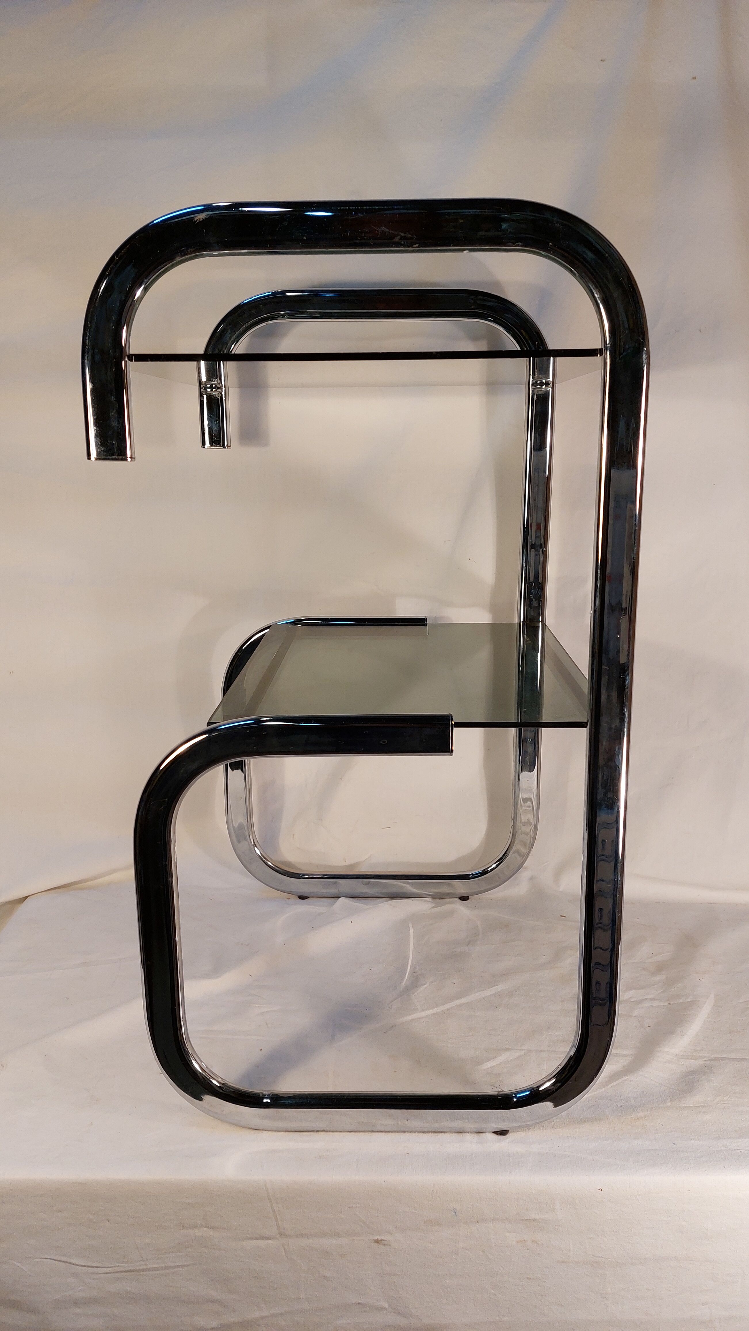 Vintage side table in chrome and smoked glass