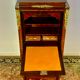 Secretary Napoleon in rosewood, violet wood and gilded bronzes.