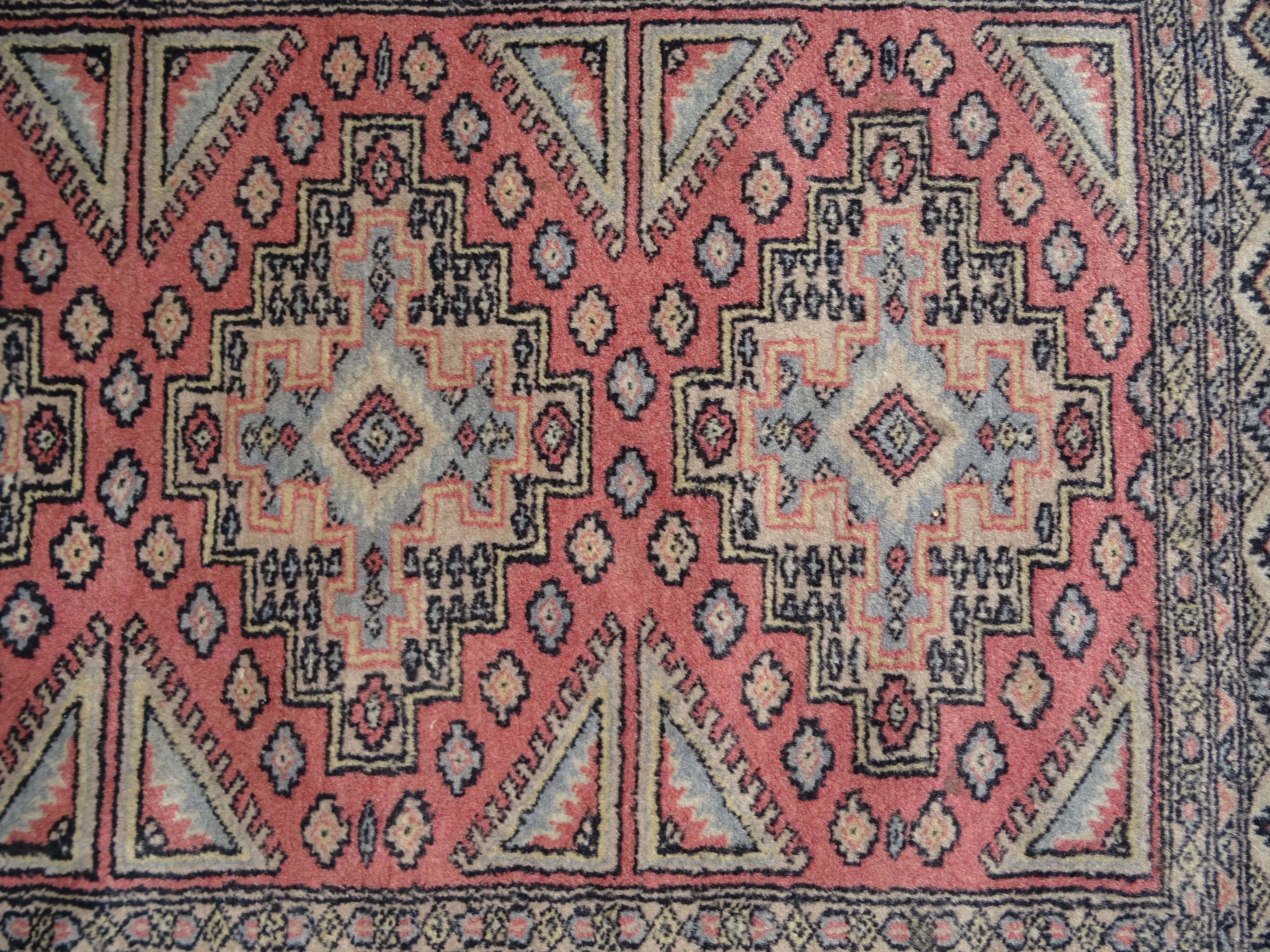 Pakistani carpet Bukhara handmade wool signed