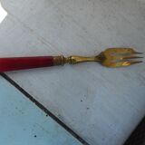 Twelve bakelite handle cake forks
