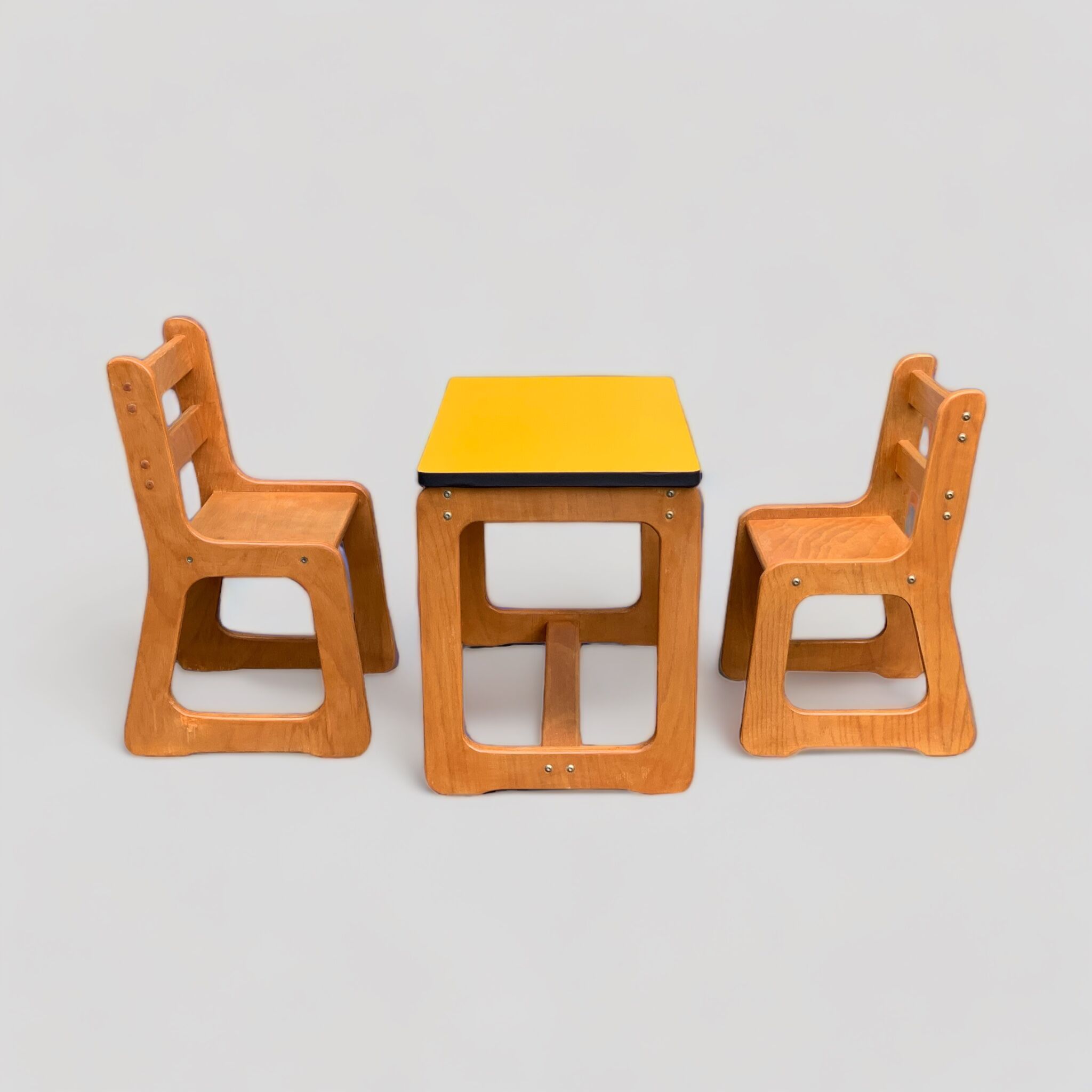 Children's wooden and formica desk and sled chairs 1970