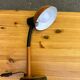 Vintage 70s desk lamp with a swan neck in terracotta and black, space age style.
