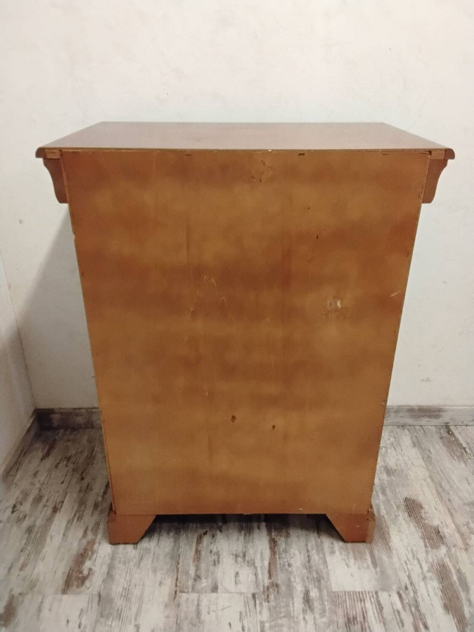 Wooden chest of drawers with a secret drawer