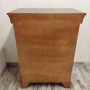 Wooden chest of drawers with a secret drawer