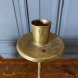 Paire de bougeoirs en laiton décor d'étoile XXe