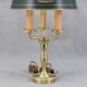 Empire style hot water bottle lamp in solid bronze three lights Lucien Gau
