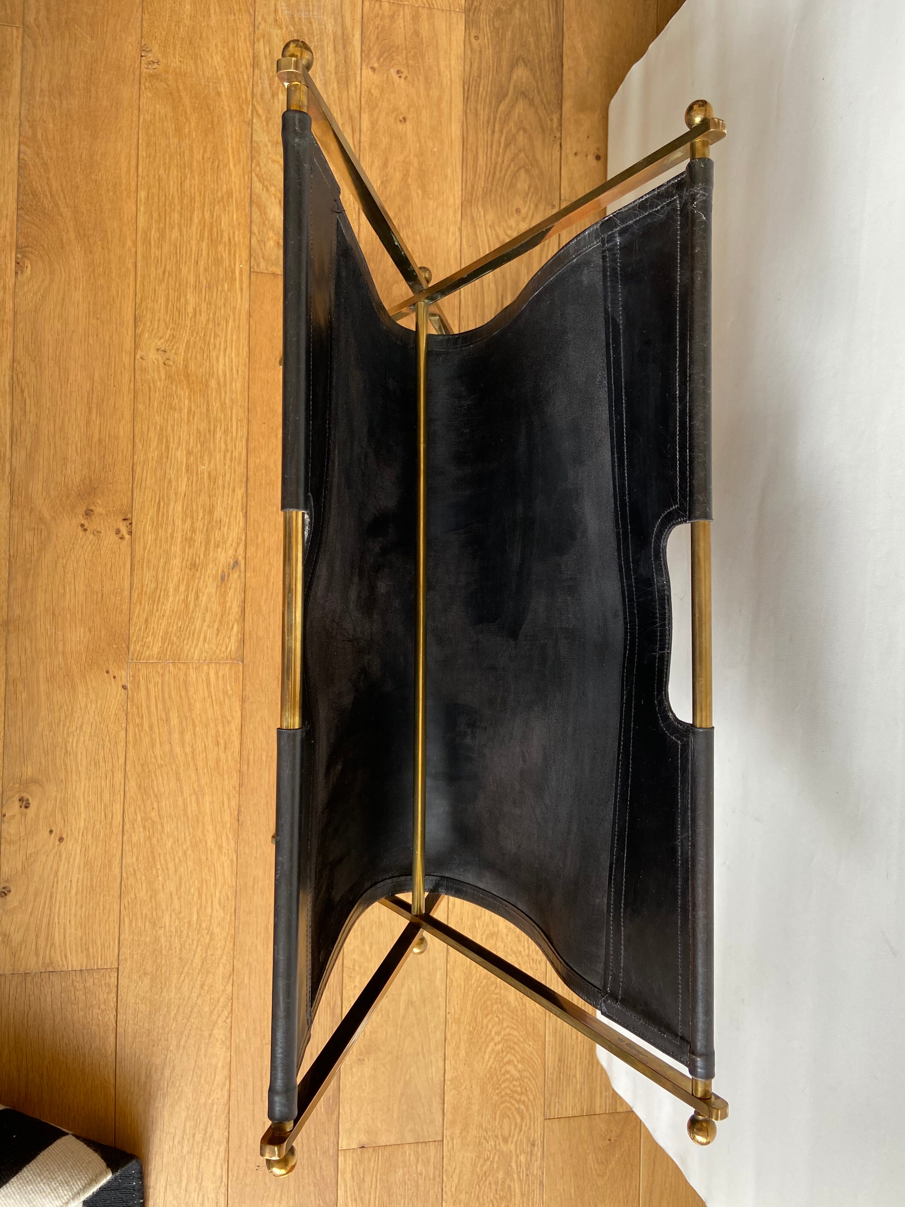 Leather and gilded brass magazine holder