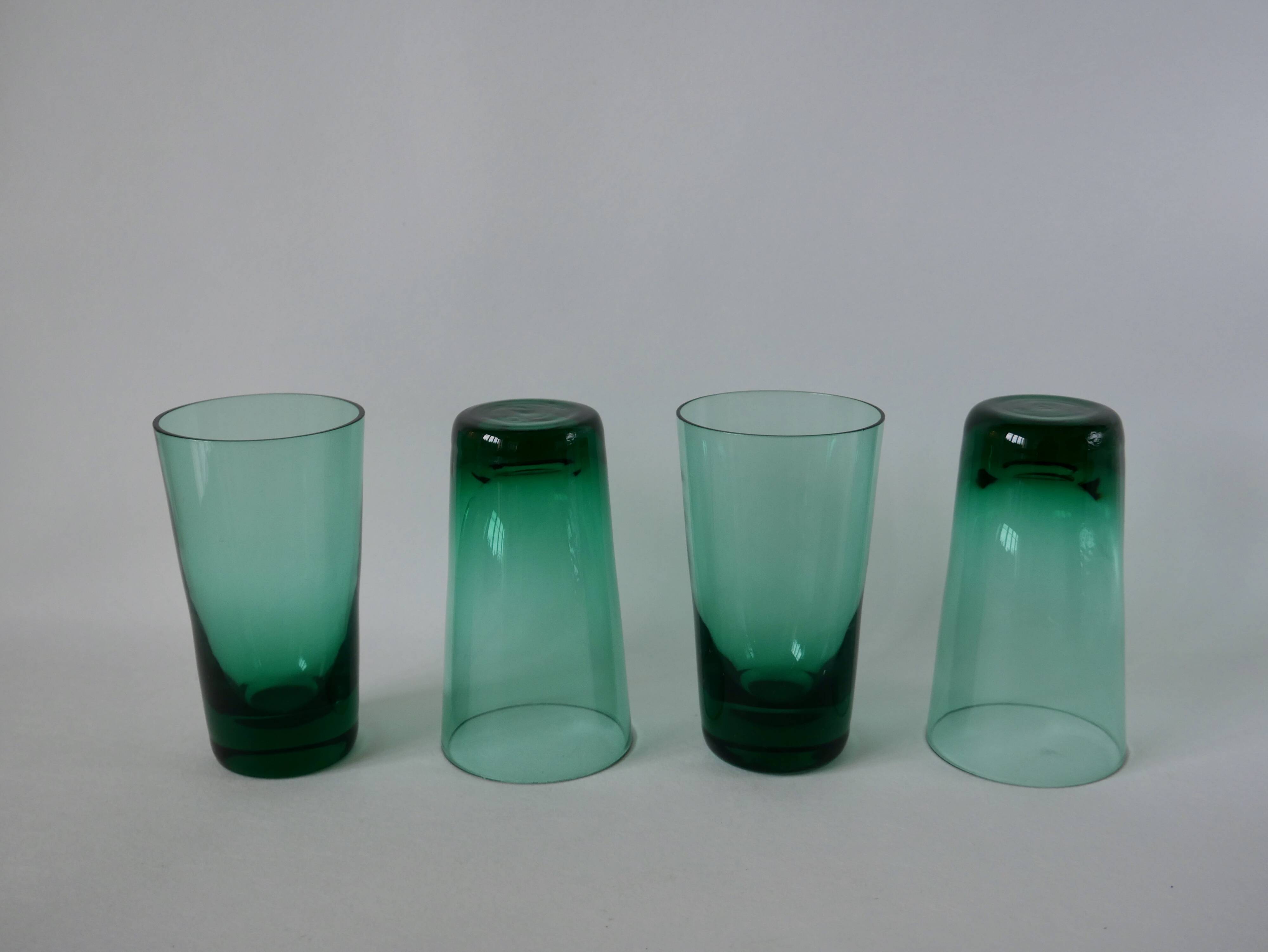 Set of a carafe and 4 designer glasses in green glass from the 70s