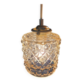 Moulded glass lamp with a cubic-spherical relief design.