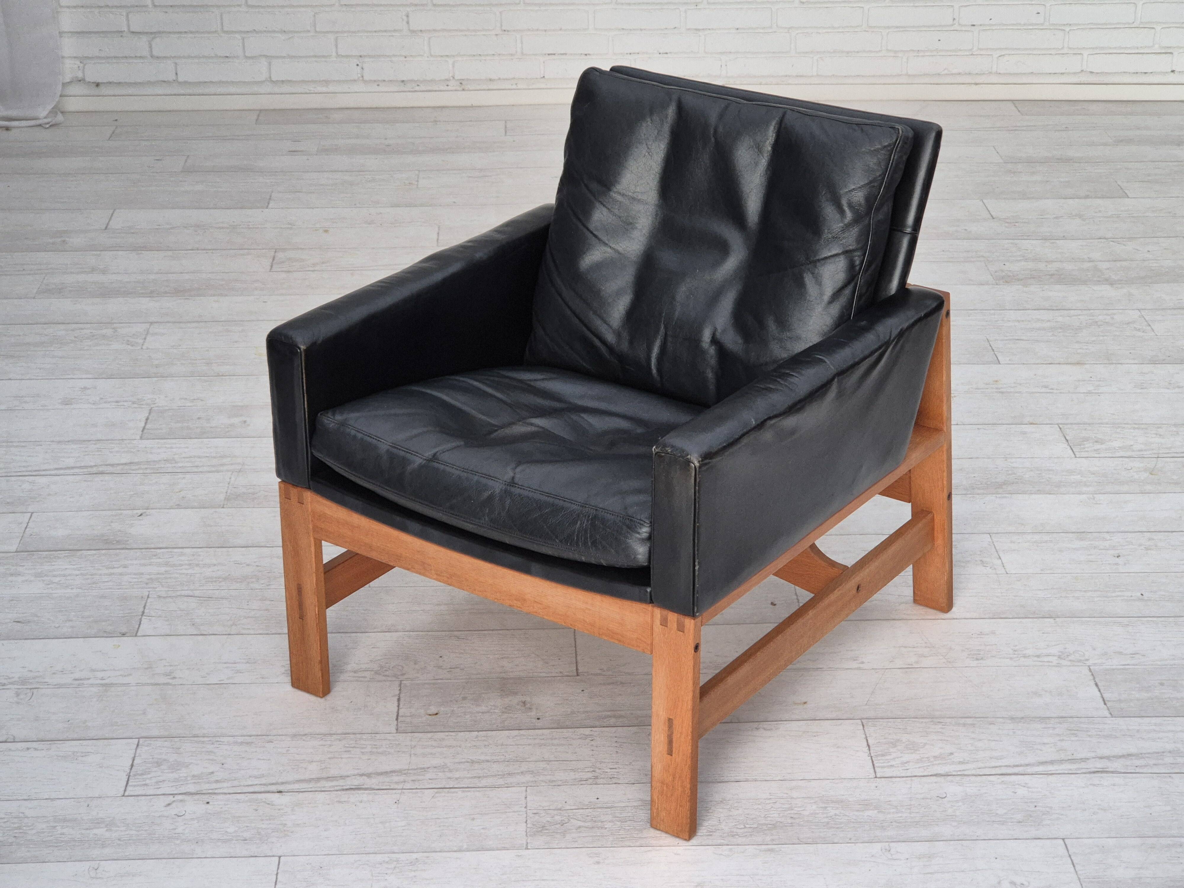 1960s, Danish lounge chair, original condition, furniture leather, solid oak wood.