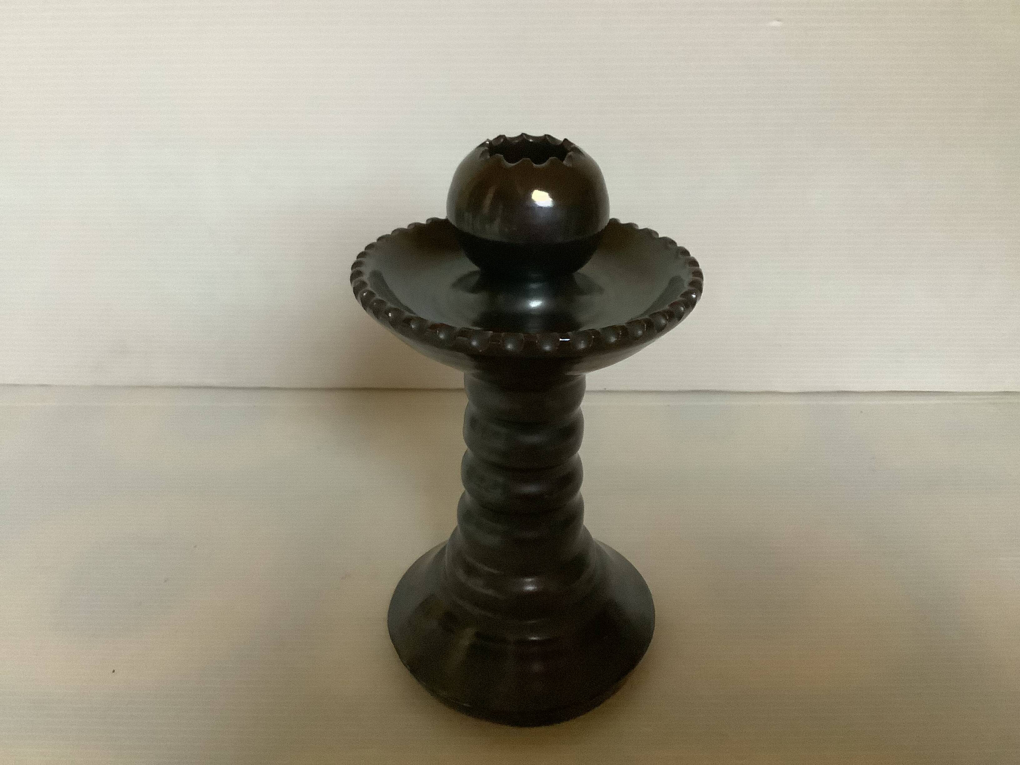 Brown glazed candlestick