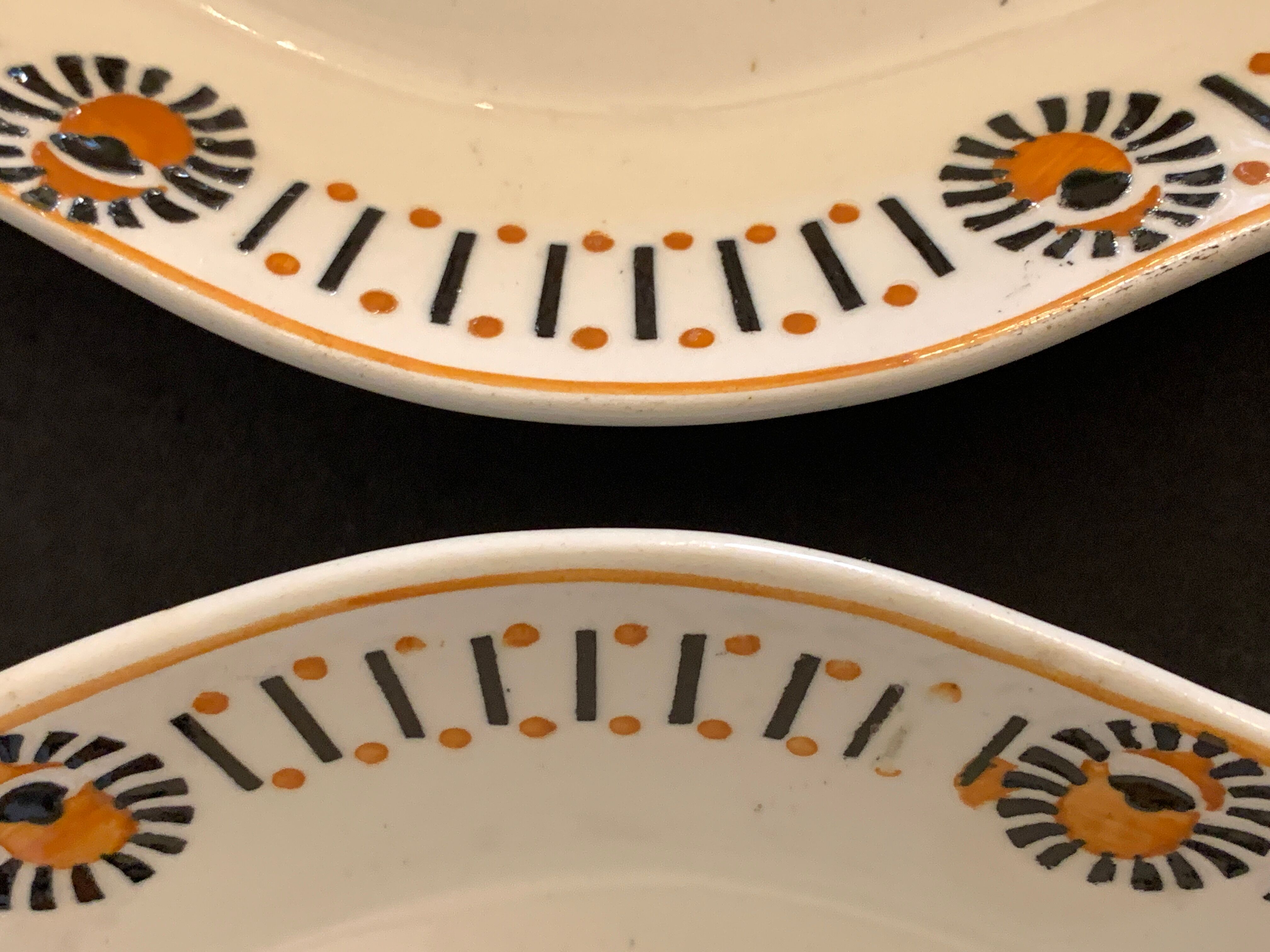 Pair of art deco raviers signed Longwy and numbered, model Gerazine