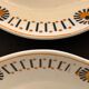 Pair of art deco raviers signed Longwy and numbered, model Gerazine