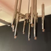 Scoliari chandelier with 18 bright nickel dots distributed by Boulanger