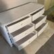 White rattan bedroom set: chest of drawers, mirror, bed, basket