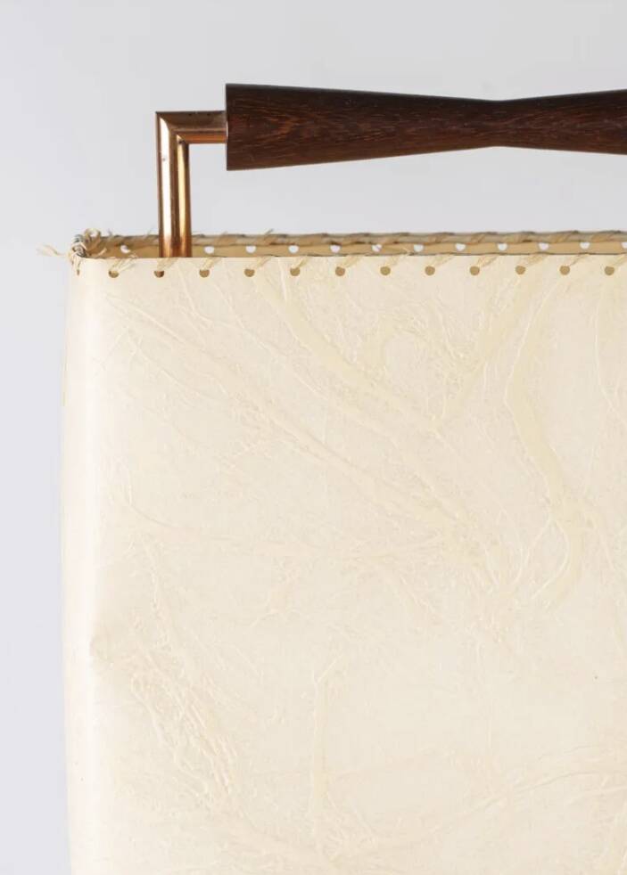 Wood and copper metal floor lamp with parchment.