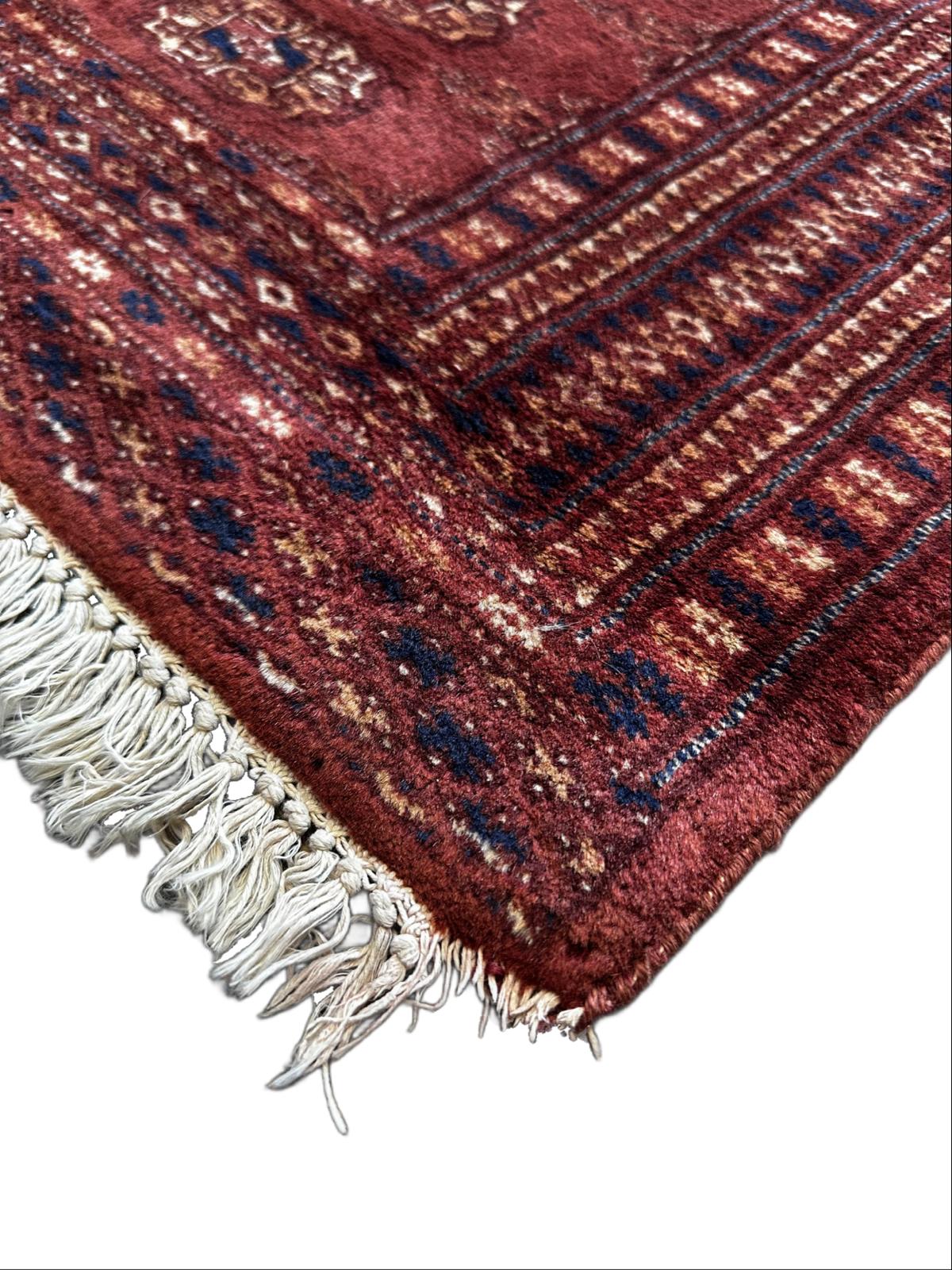 Handmade oriental hallway rug, 180cm x 70cm.