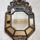 Old octagonal mirror with brass glazing beads