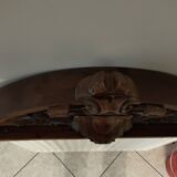old pediment in carved walnut
