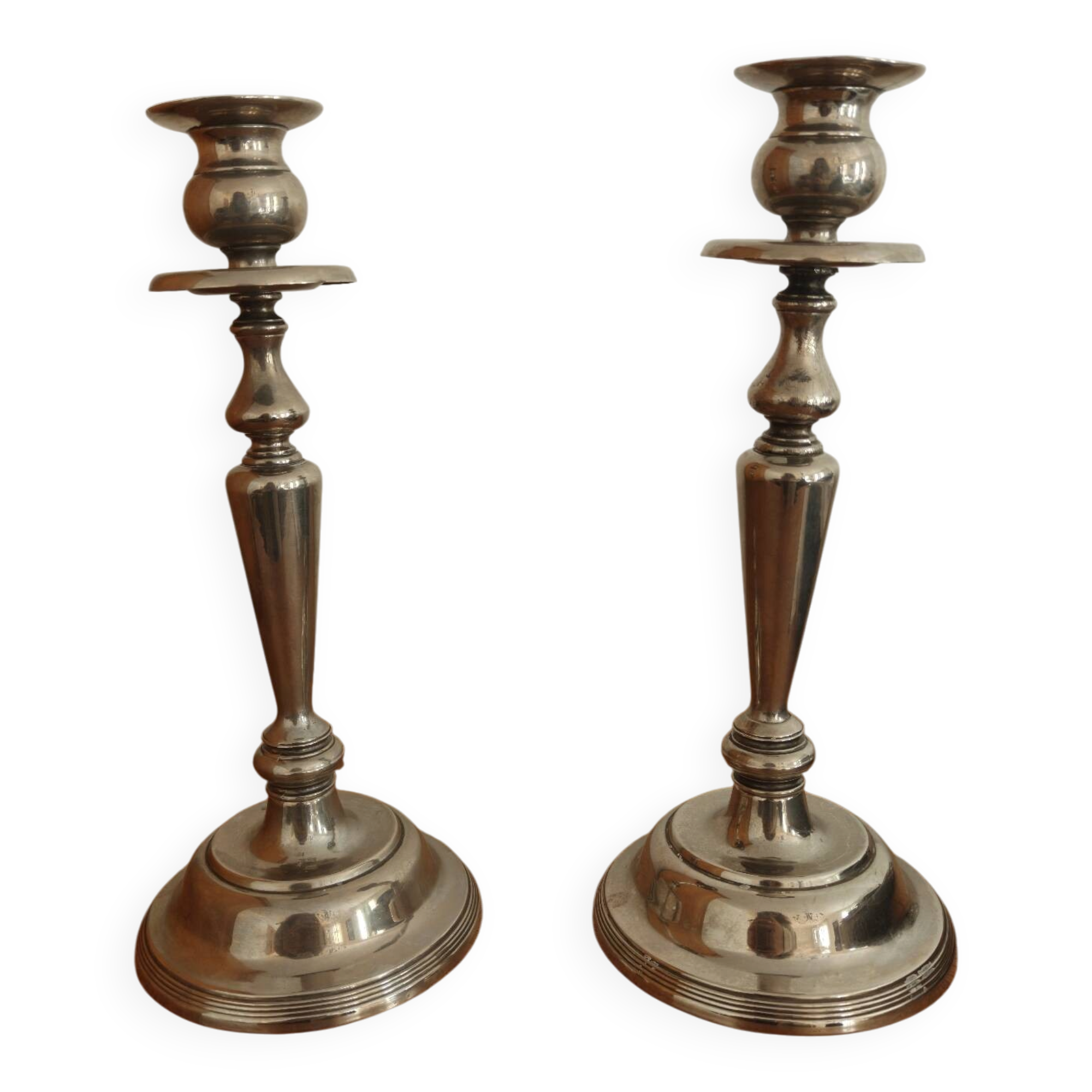Pair of antique silver-plated candlesticks