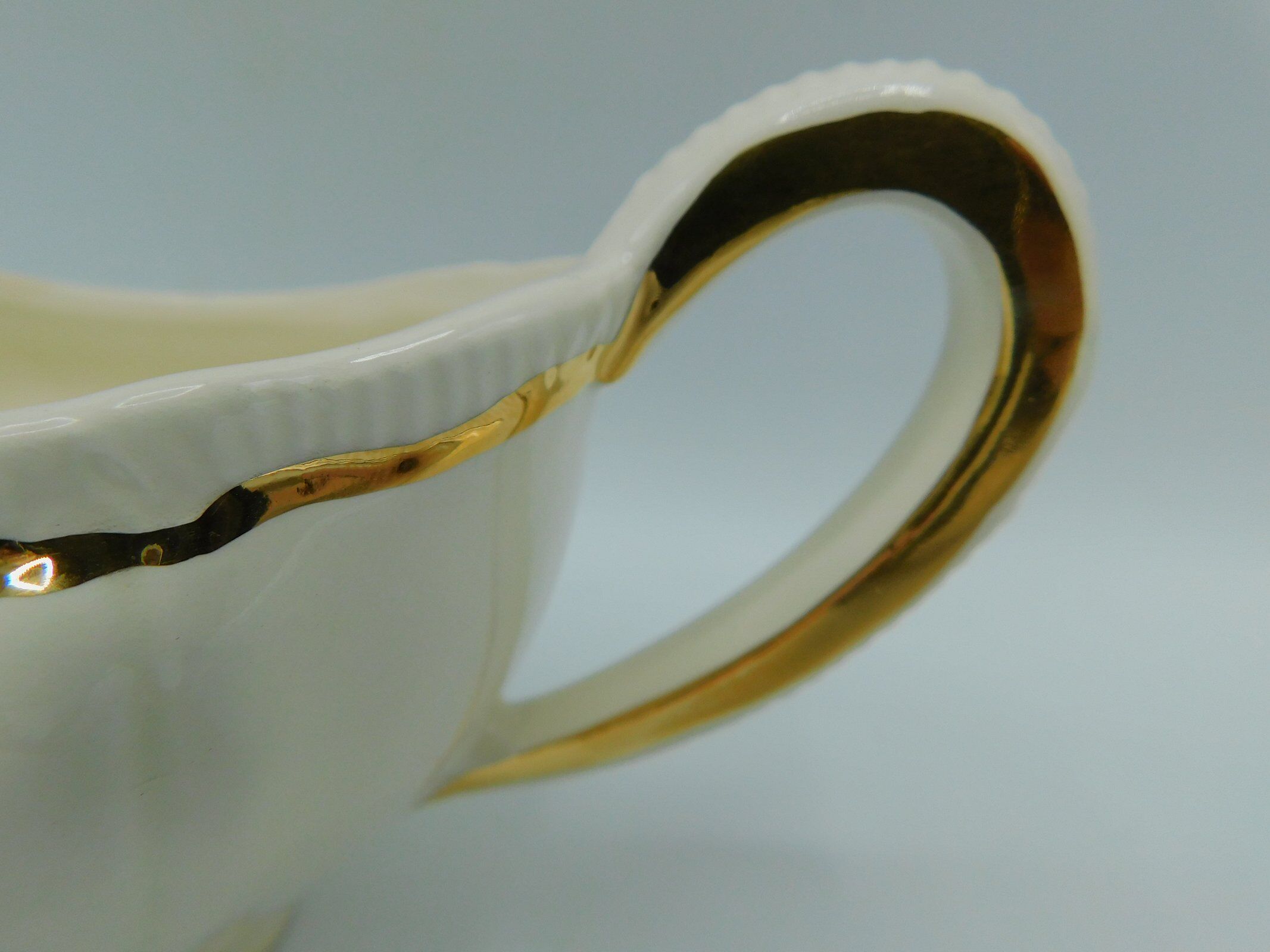 Longchamp ivory and gold saucière