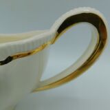Saucière ivoire et or Longchamp