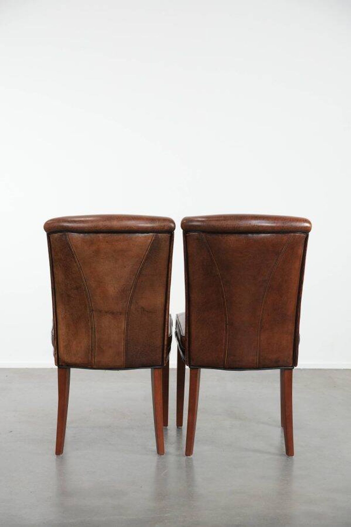 Comfortable set of 2 sheep leather dining chairs with character