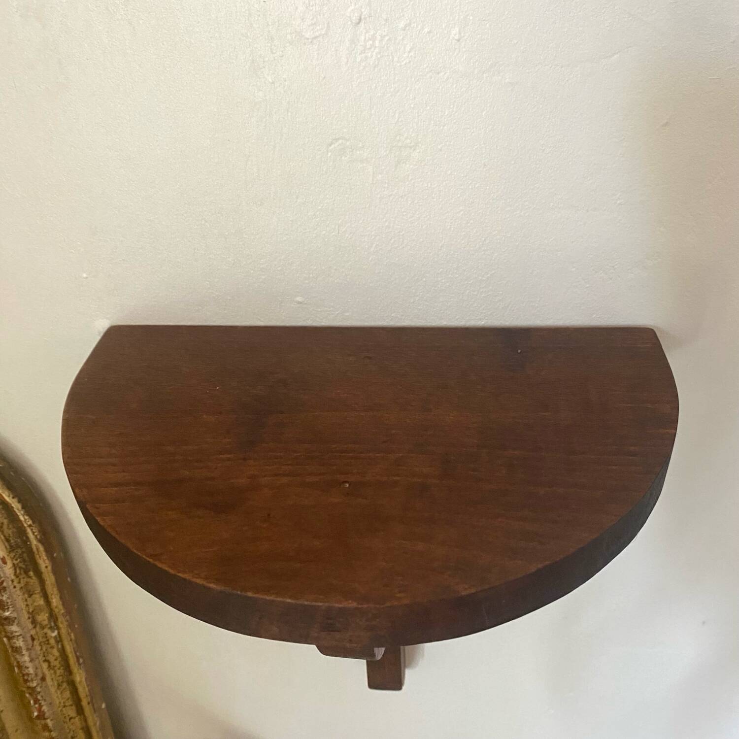 Half-moon wall shelves