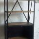 Industrial shelf made of solid exotic mango wood with riveted metal.
