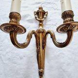 French Empire-style wall sconce or chandelier in bronze with an antique gold patina.