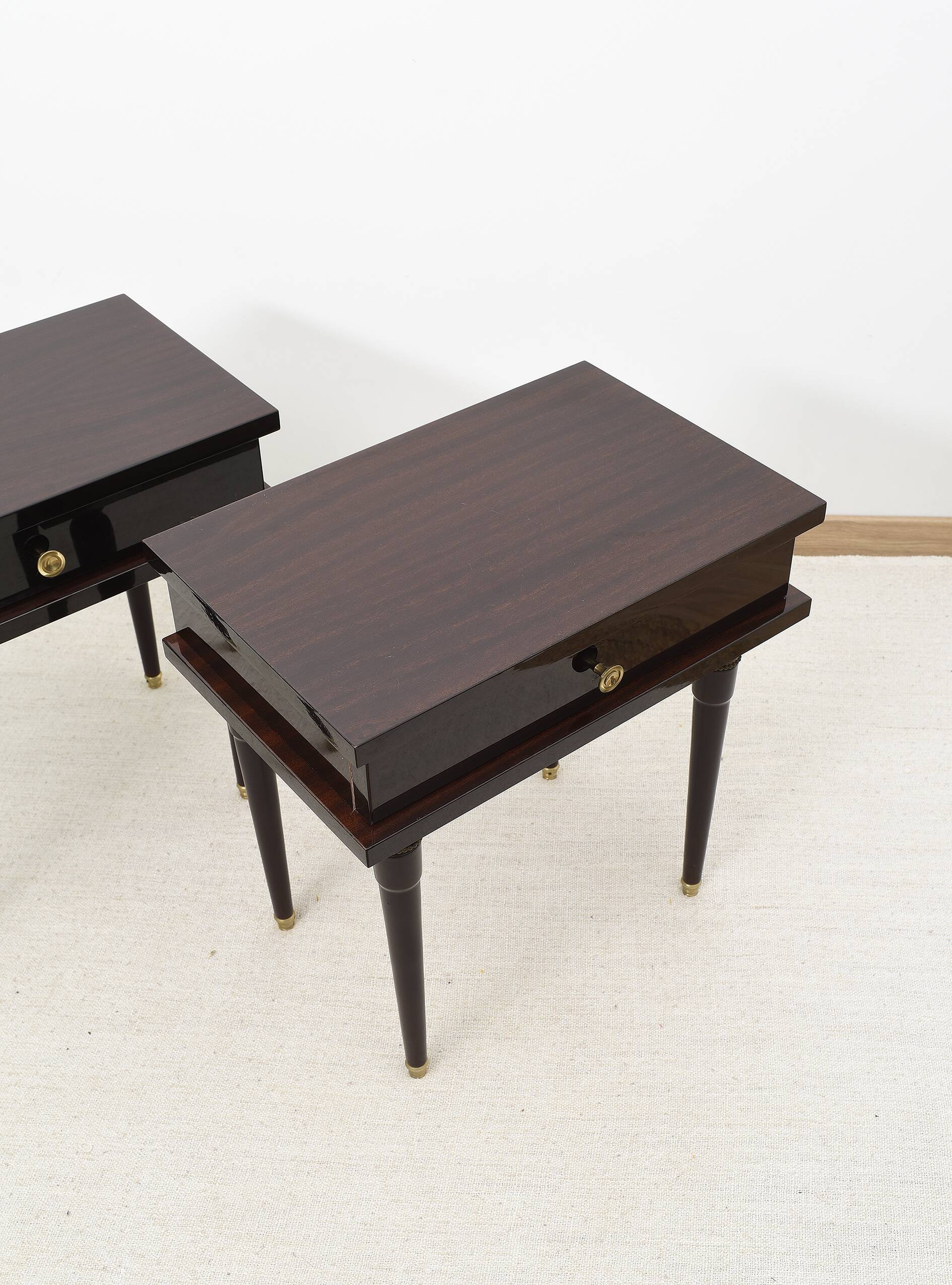 Pair of rosewood bedside tables, with drawer.
