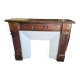 Facade of antique wooden fireplace