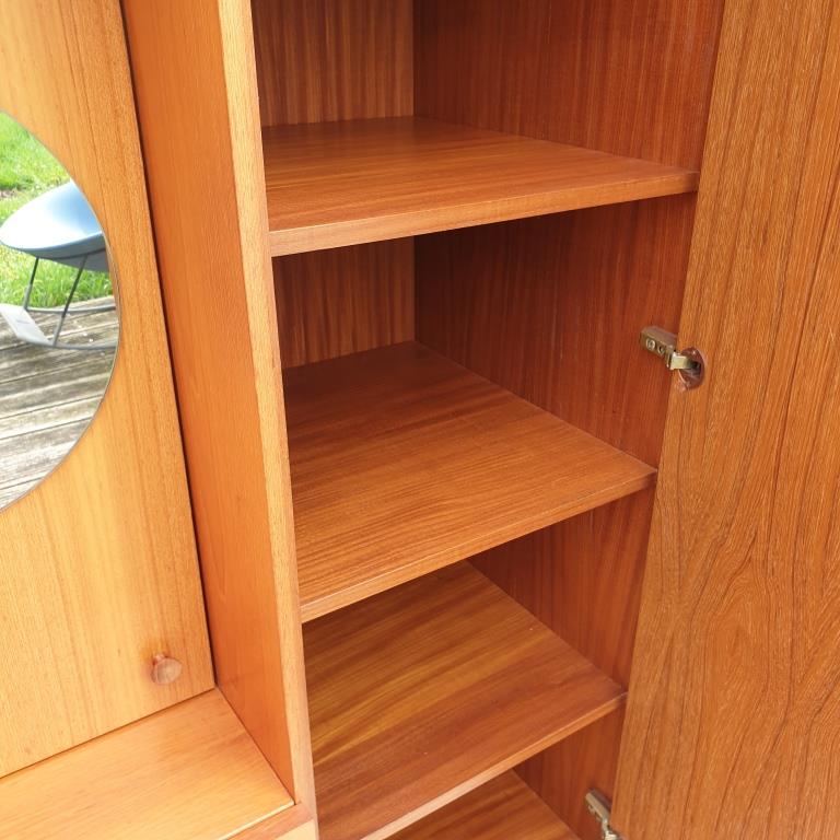 Scandinavian dressing cabinet with round mirror