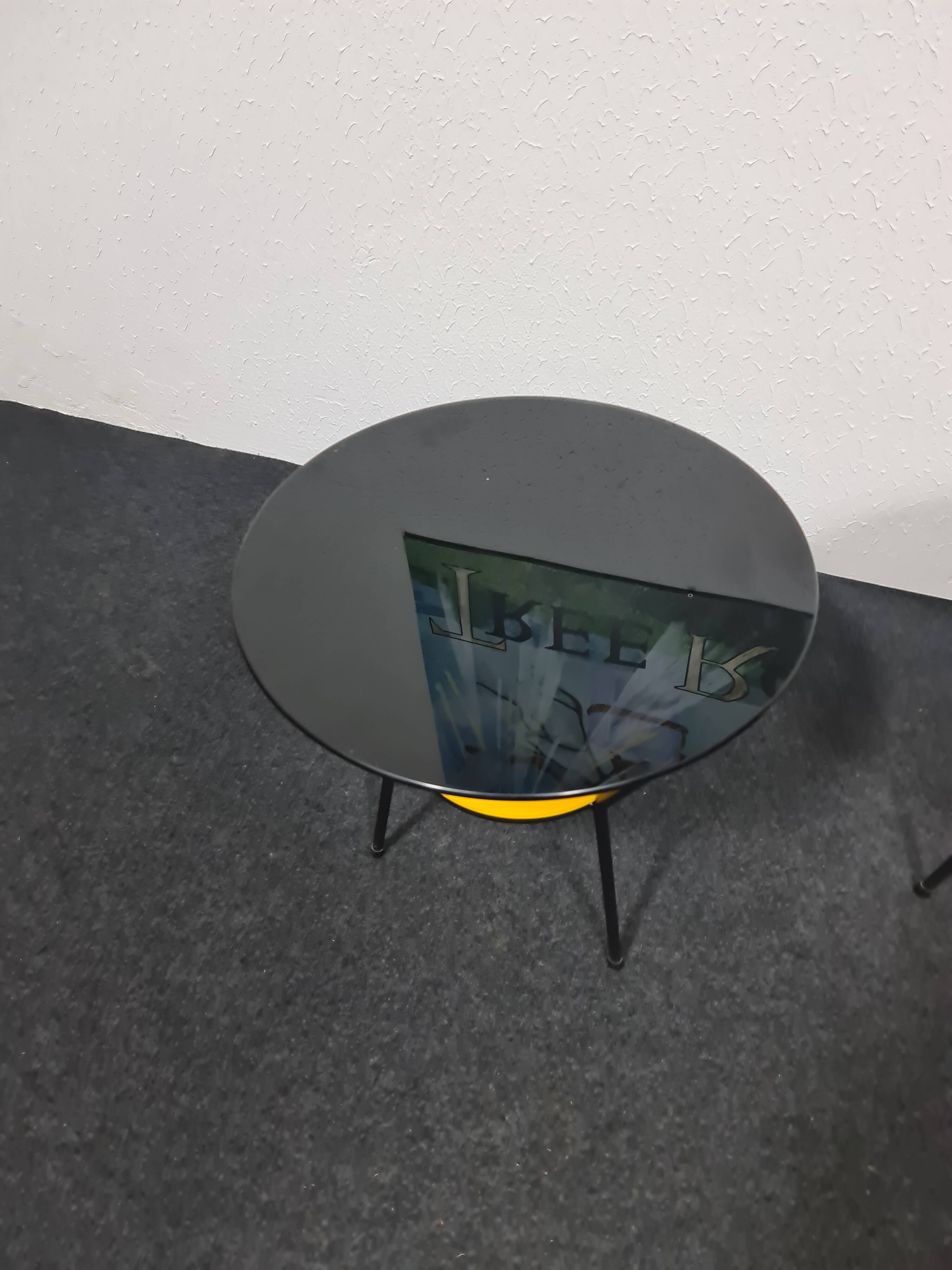 Pair of vintage glass topped side tables