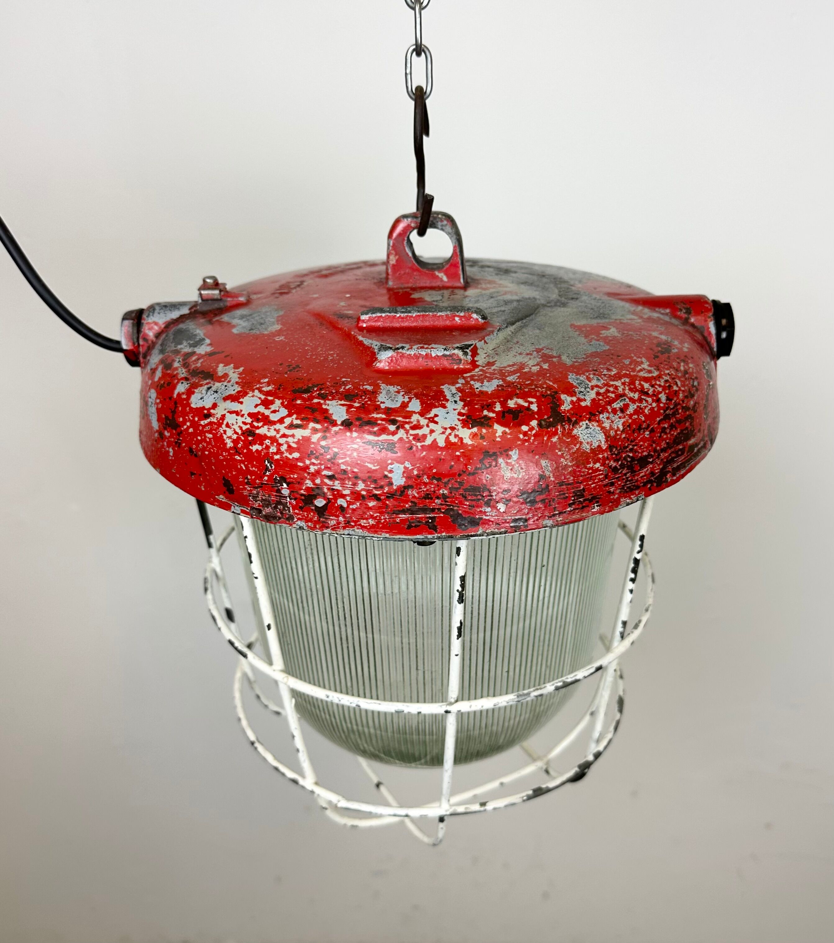 Red industrial cast iron cage pendant light, 1960s