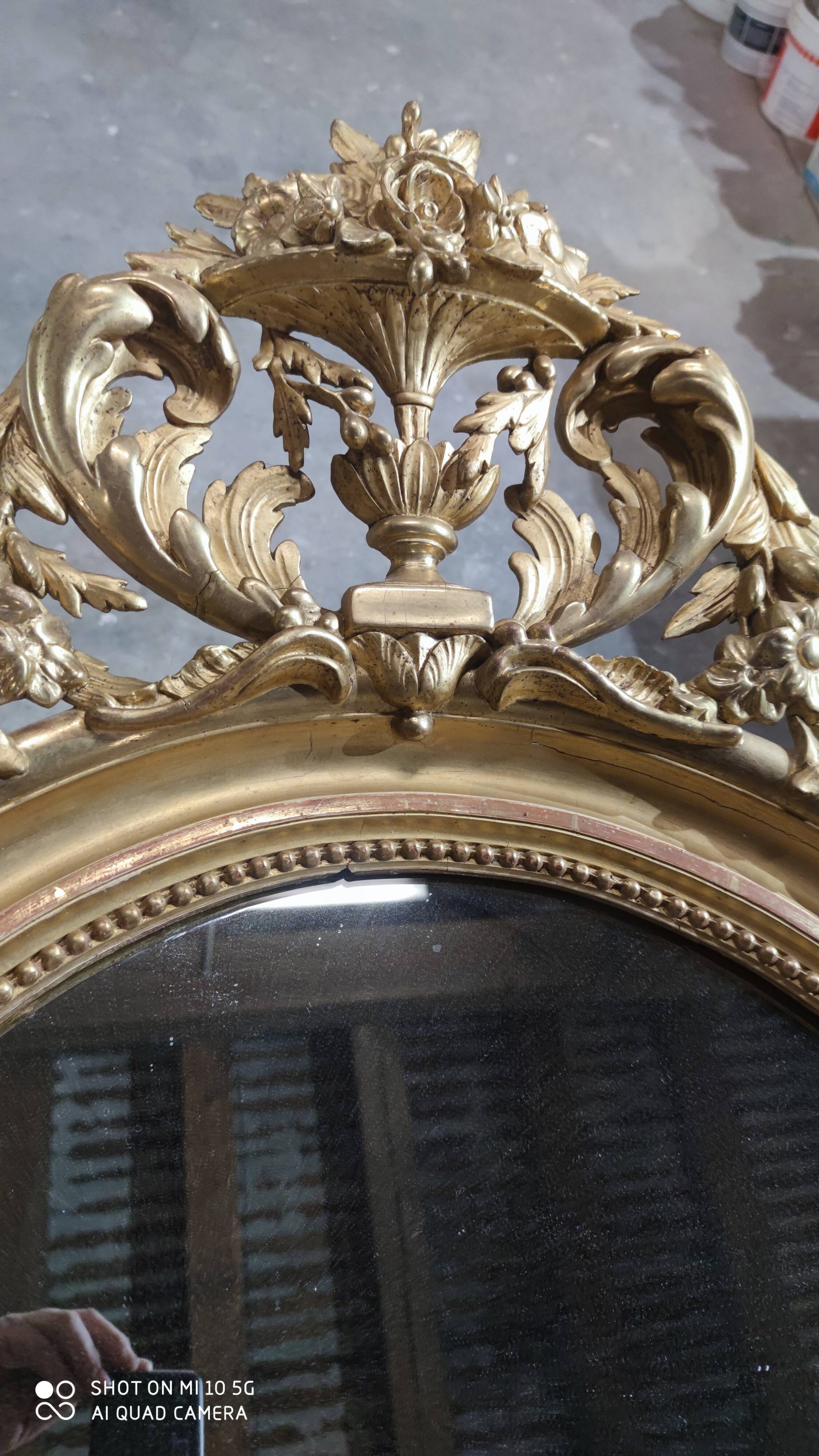 Mirror with a gilt medallion pediment, 1840